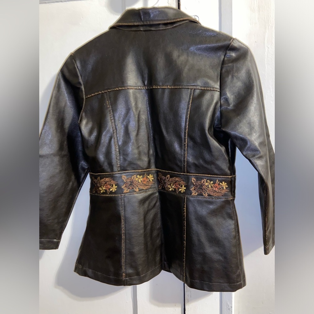 Faux leather jacket w/ sewn in floral pattern